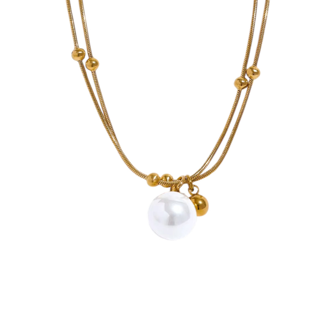 Close-up of the Iris Pearl Gold Necklace — triple waterproof gold chain with luminous pearl charm