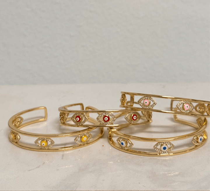 HOLIDAYS 22, Spring 2024 White Bracelets Mannaz Designs Protective Evil Eye Gold Bangle Bracelet - Empower Your Style 